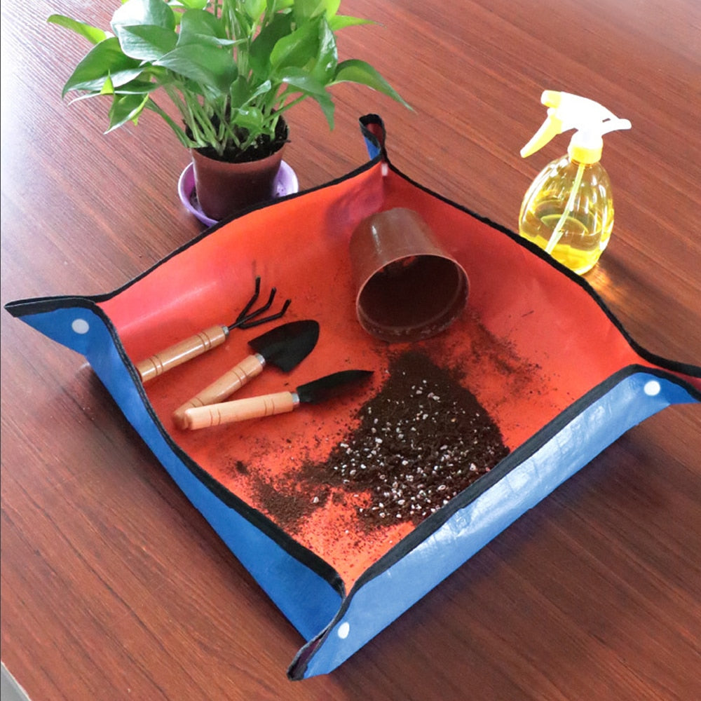Waterproof PE garden potting pad with raised locked corners for mess-free indoor plant repotting. — view 2
