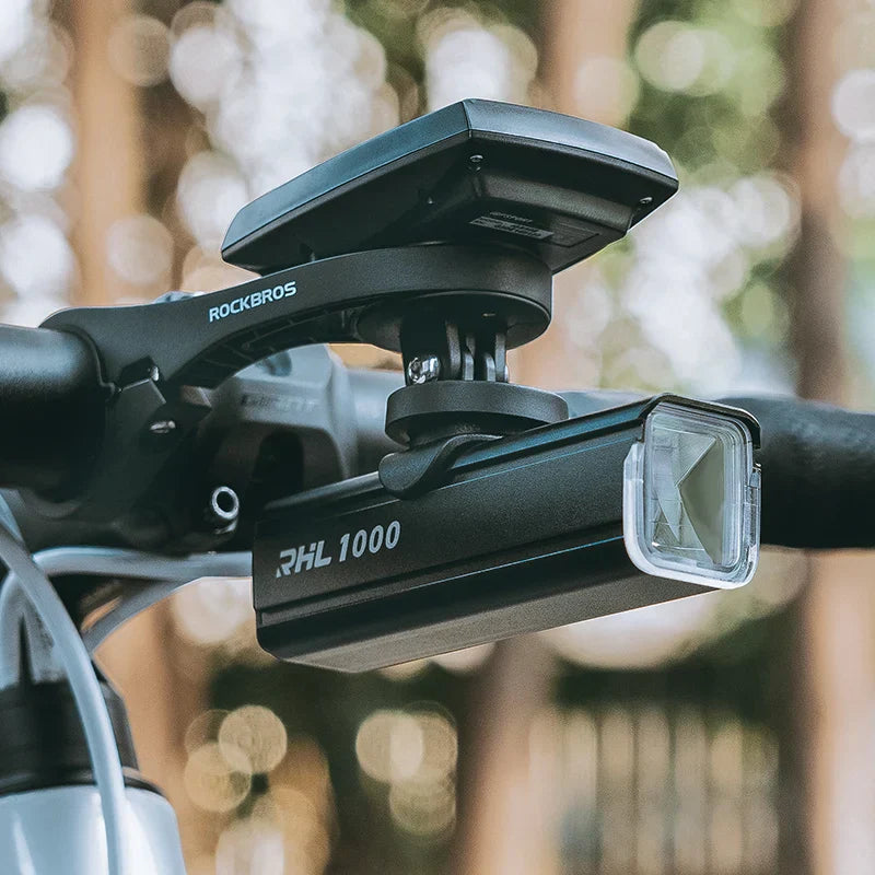 Black aluminum 1000 lumen bike light with USB-C port and dual position handlebar mounting bracket — view 3