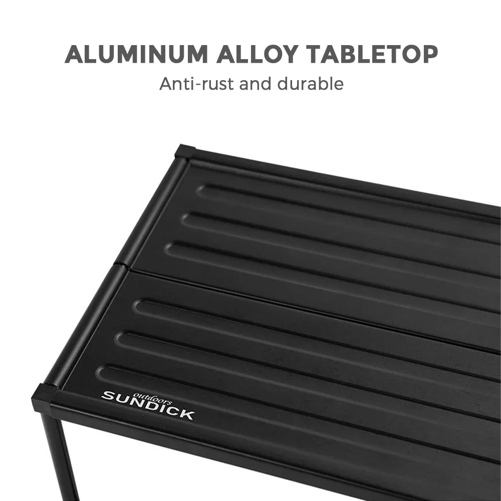 Black folding portable camping table made of lightweight aluminum alloy with included carrying storage bag — view 3