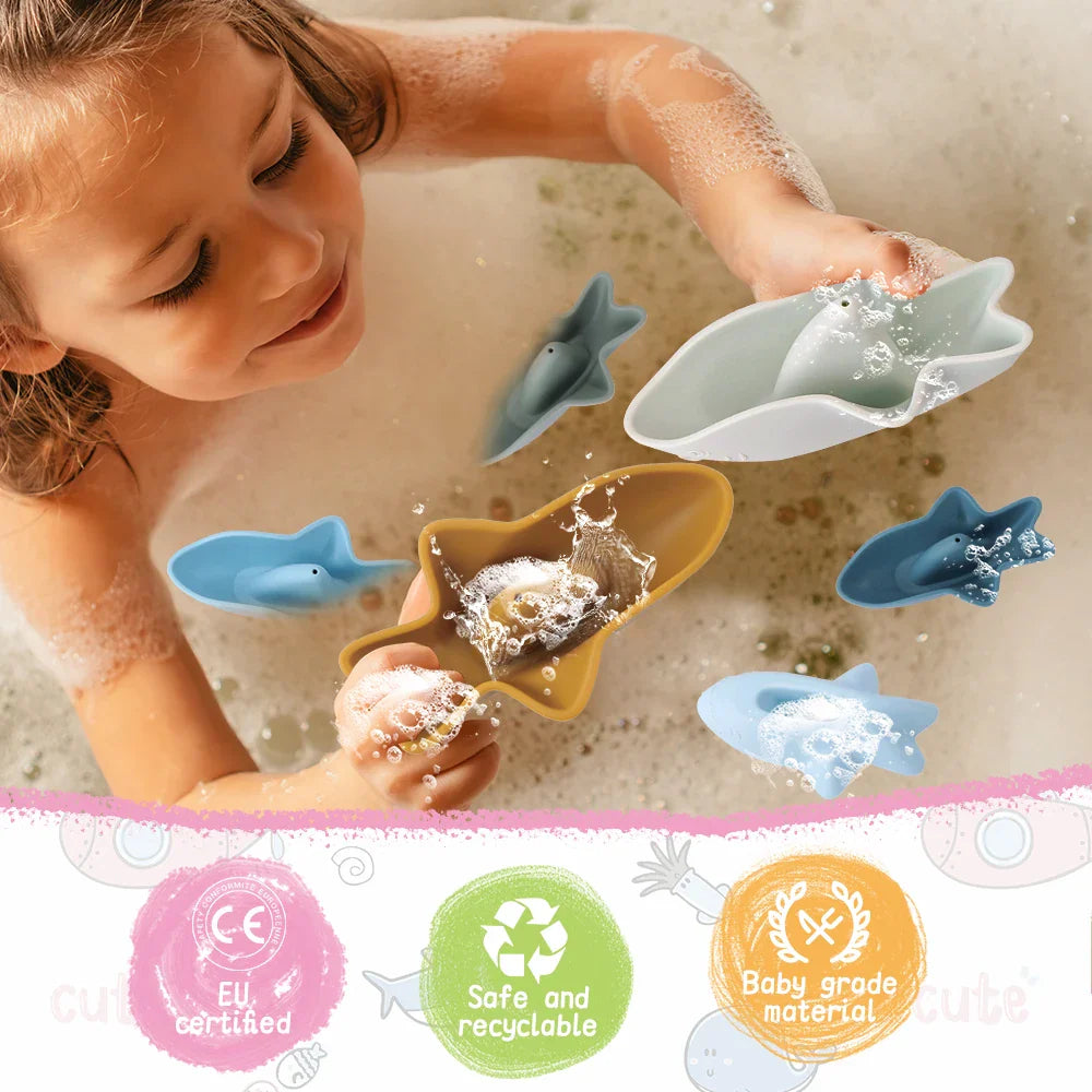 Silicone shark bath toy set of three in soft oceanic colors stacked for compact storage — view 4