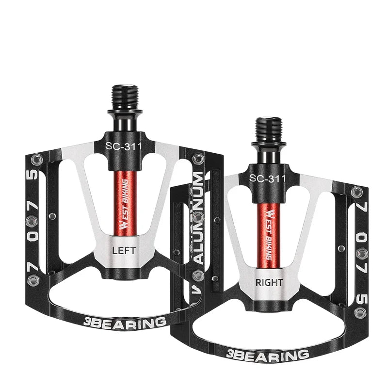Black 3-bearing CNC aluminum bike pedals with anti-slip traction pins and widened base.