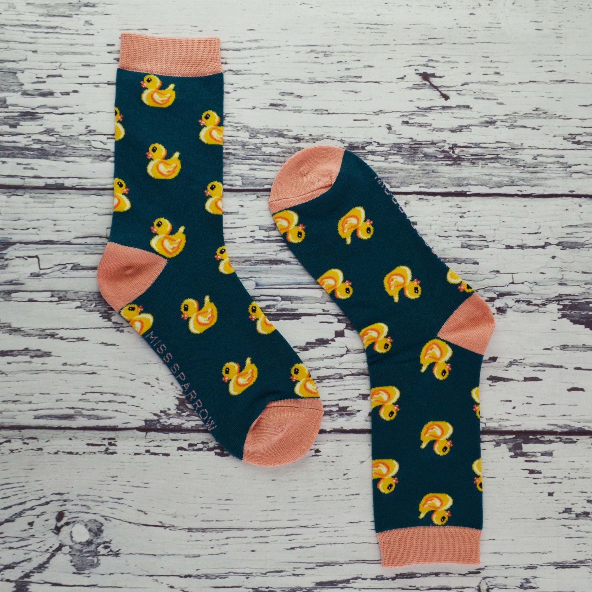 Ladies rubber duck novelty socks in teal bamboo blend with pink heels and toes — view 4