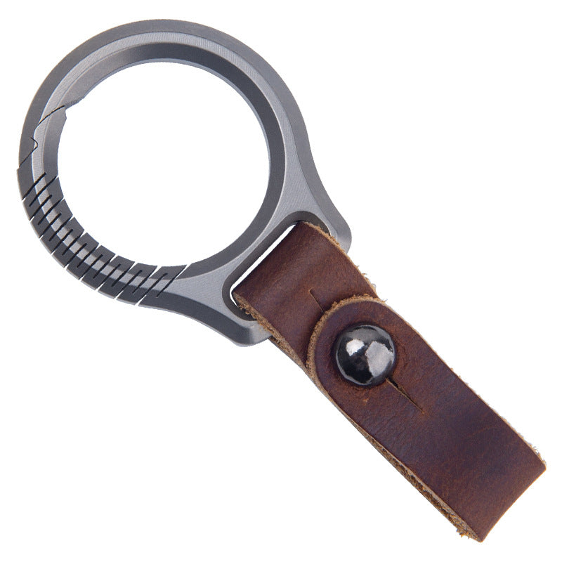 Luxury titanium keychain with magnetic rotary buckle and top grain leather strap for car keys — view 3