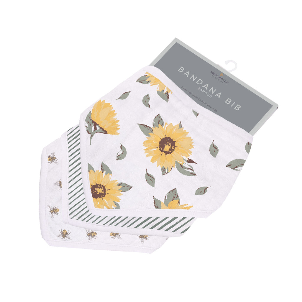 Sunrise to Sunset Bandana Bibs in natural bamboo muslin with adorable sunflower and bee patterns.