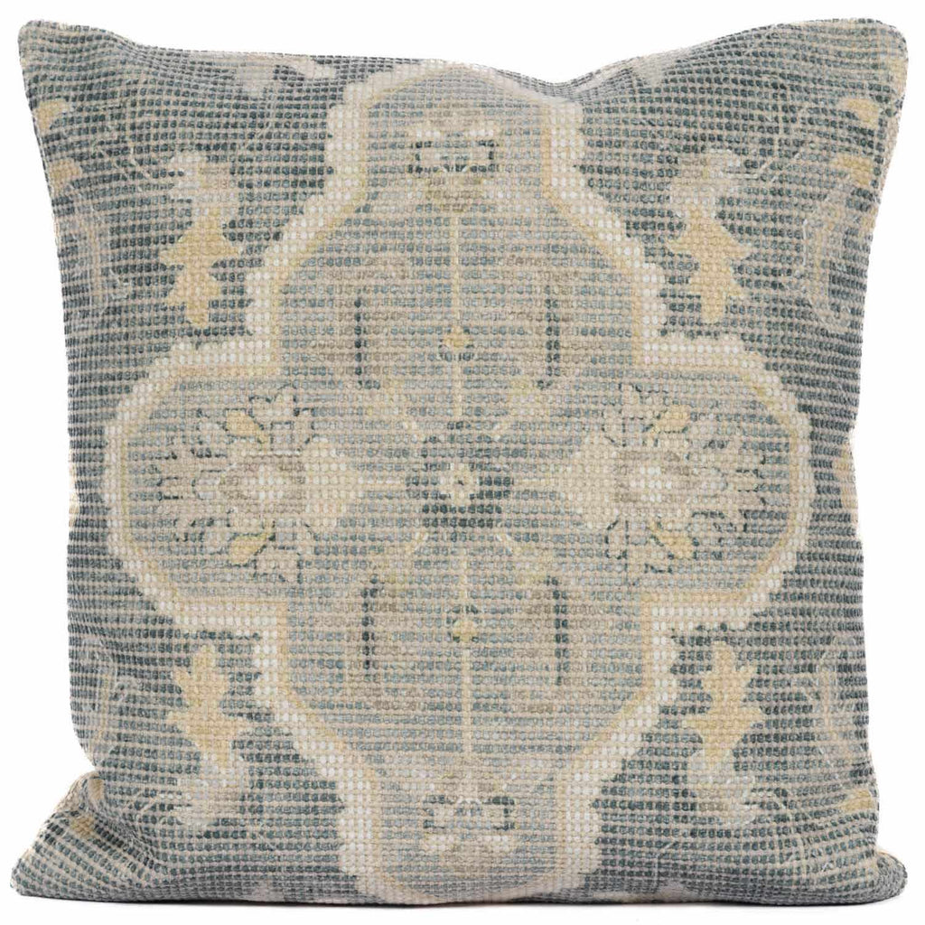 Woven Bigaa throw pillow cover in teal, gray, and peach traditional pattern on a sofa — view 2