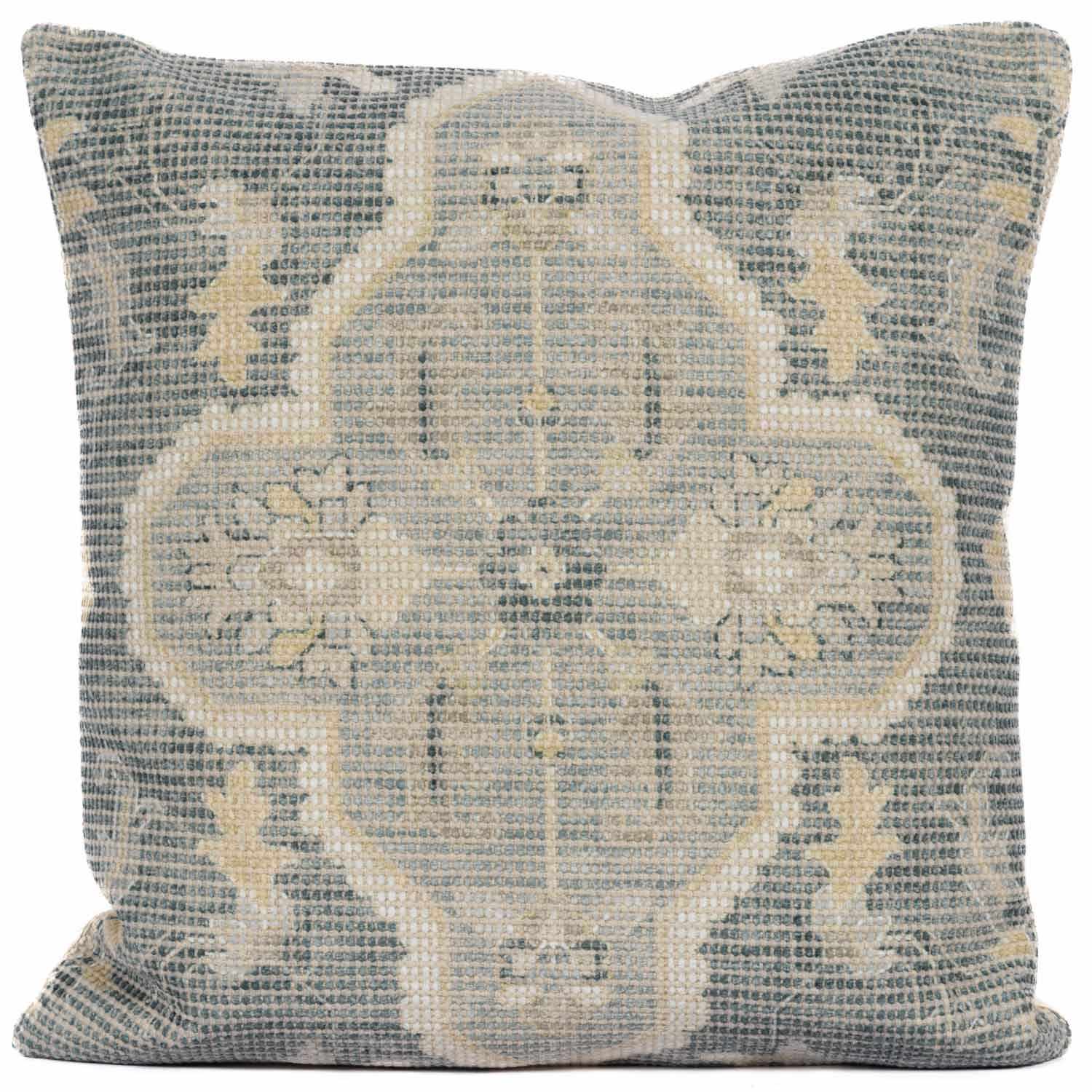 Woven Bigaa throw pillow cover in teal, gray, and peach traditional pattern on a sofa — view 2