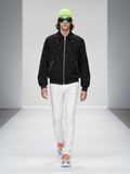 Black men's bomber jacket in technical fabric with metallic studs and front zipper details