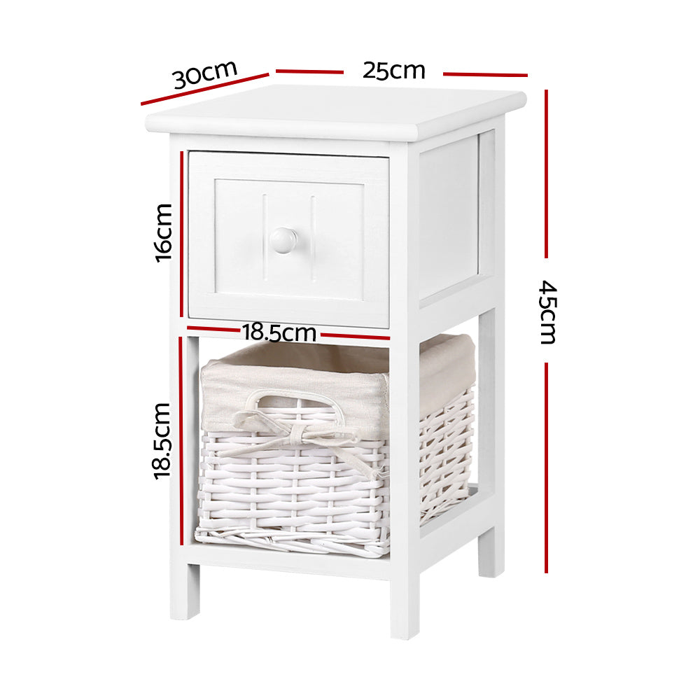 Two rustic white wood bedside tables with smooth top drawers and wicker storage baskets. — view 2