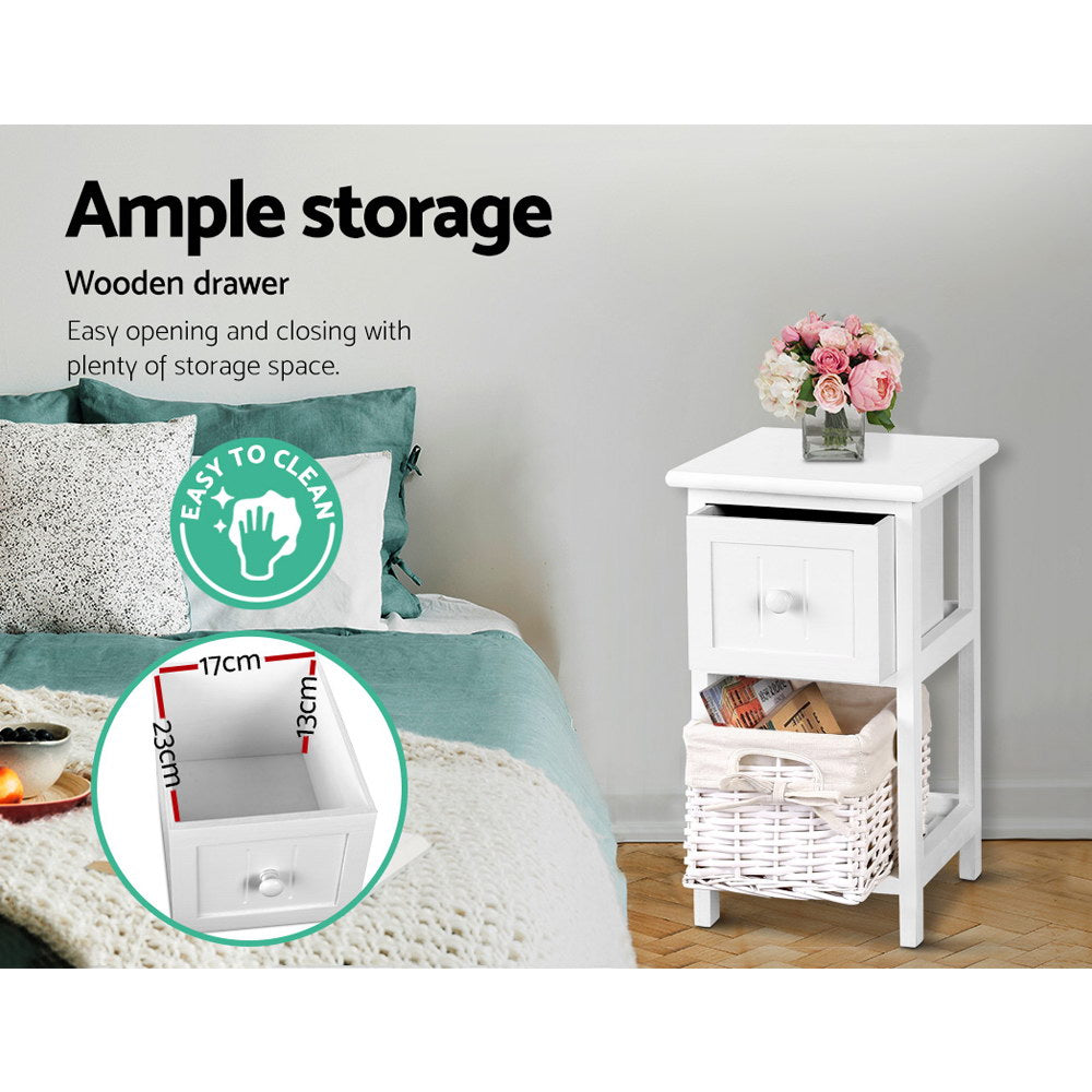 Two rustic white wood bedside tables with smooth top drawers and wicker storage baskets. — view 4