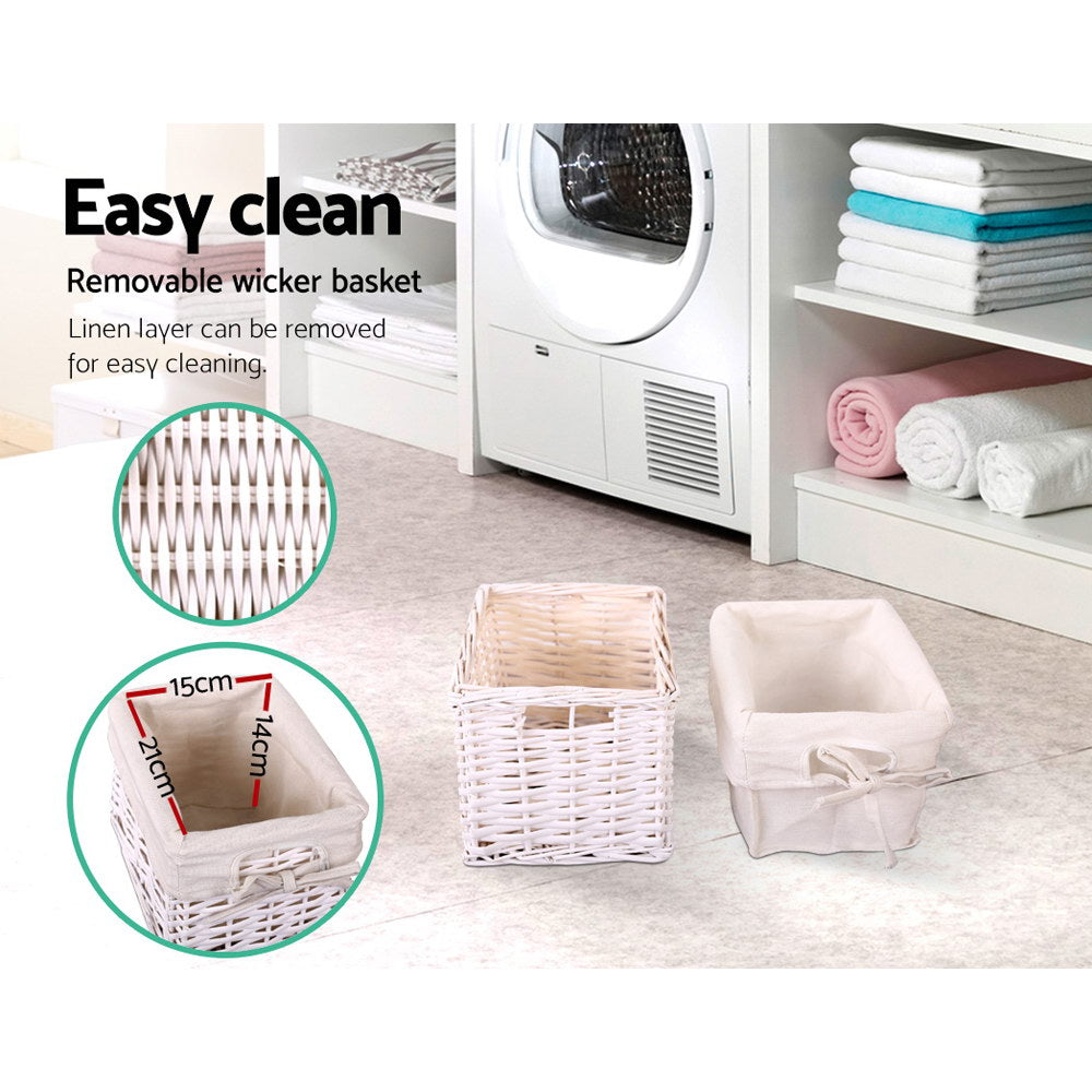 Two rustic white wood bedside tables with smooth top drawers and wicker storage baskets. — view 5
