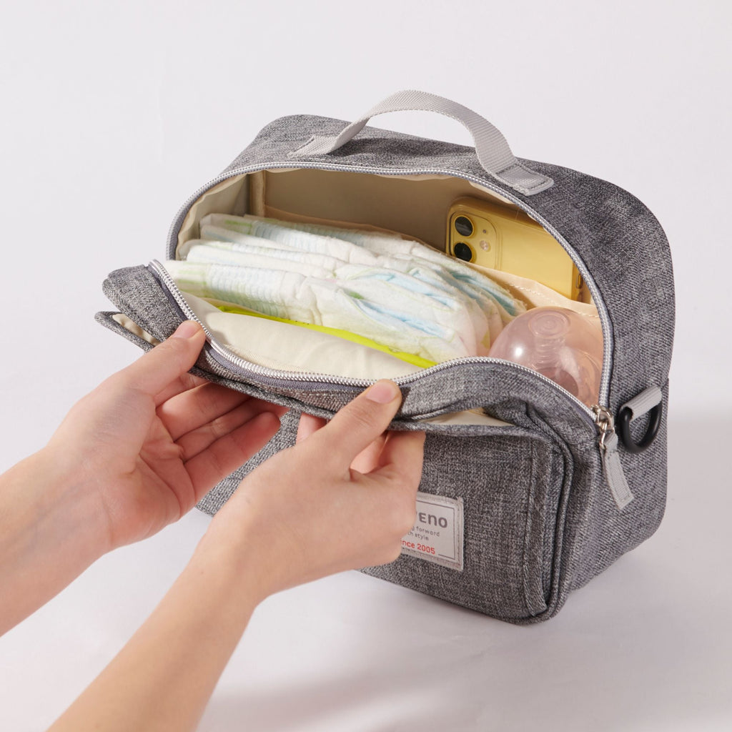 Compact diaper clutch bag with built-in baby wipe dispenser and adjustable shoulder strap for strollers — view 3