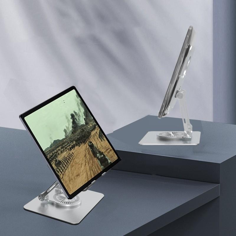 Silver aluminum ergonomic adjustable laptop stand with 360 degree rotation on a white background — view 2