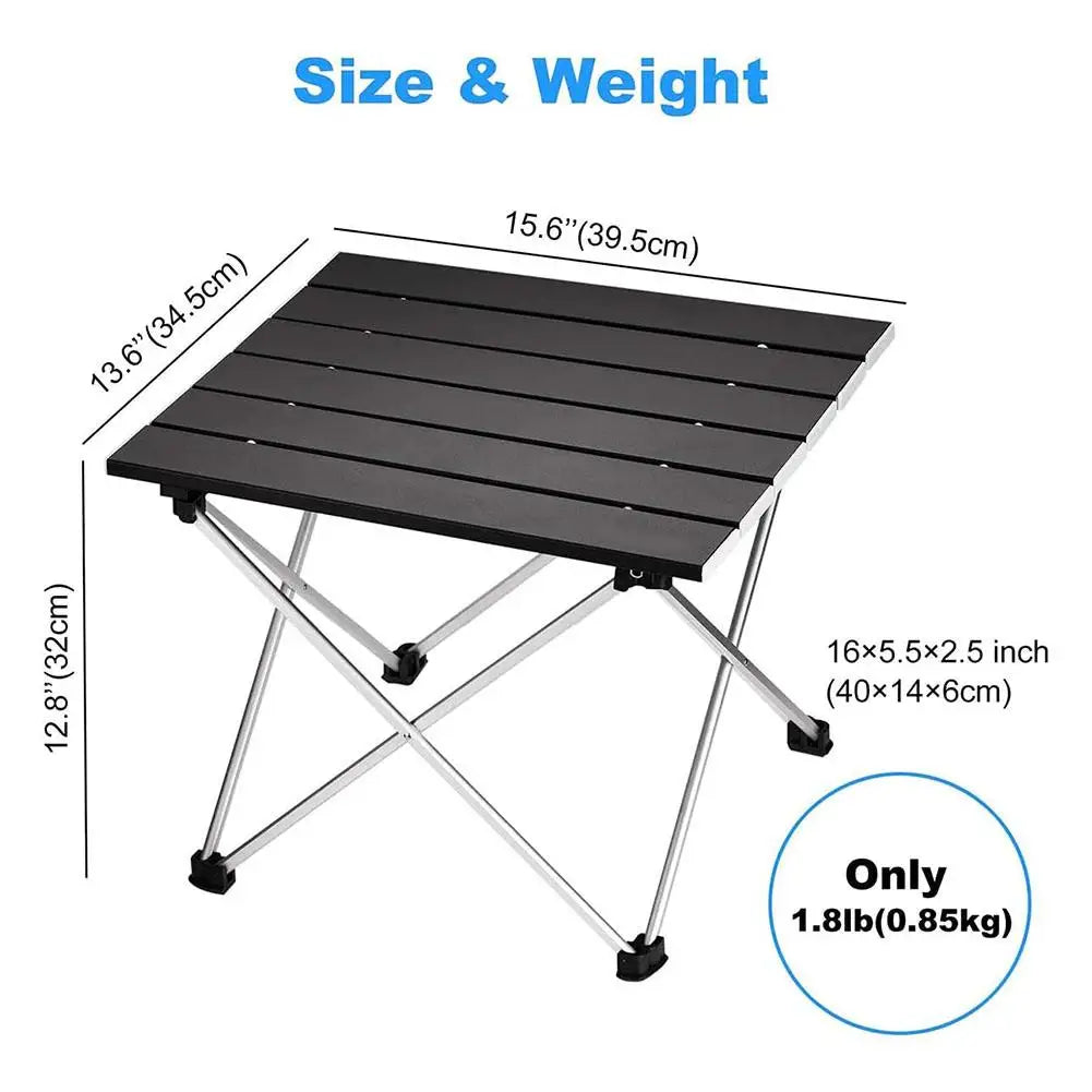 Portable aluminum camping table in silver with black folding bracket and black travel storage bag — view 5