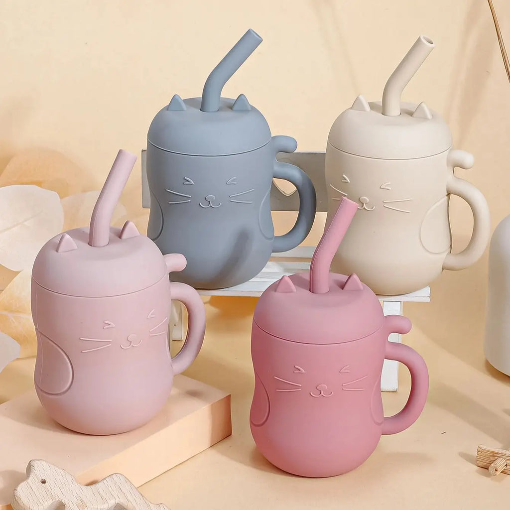 Silicone straw water bottle for kids with embossed cat face and curved tail handle