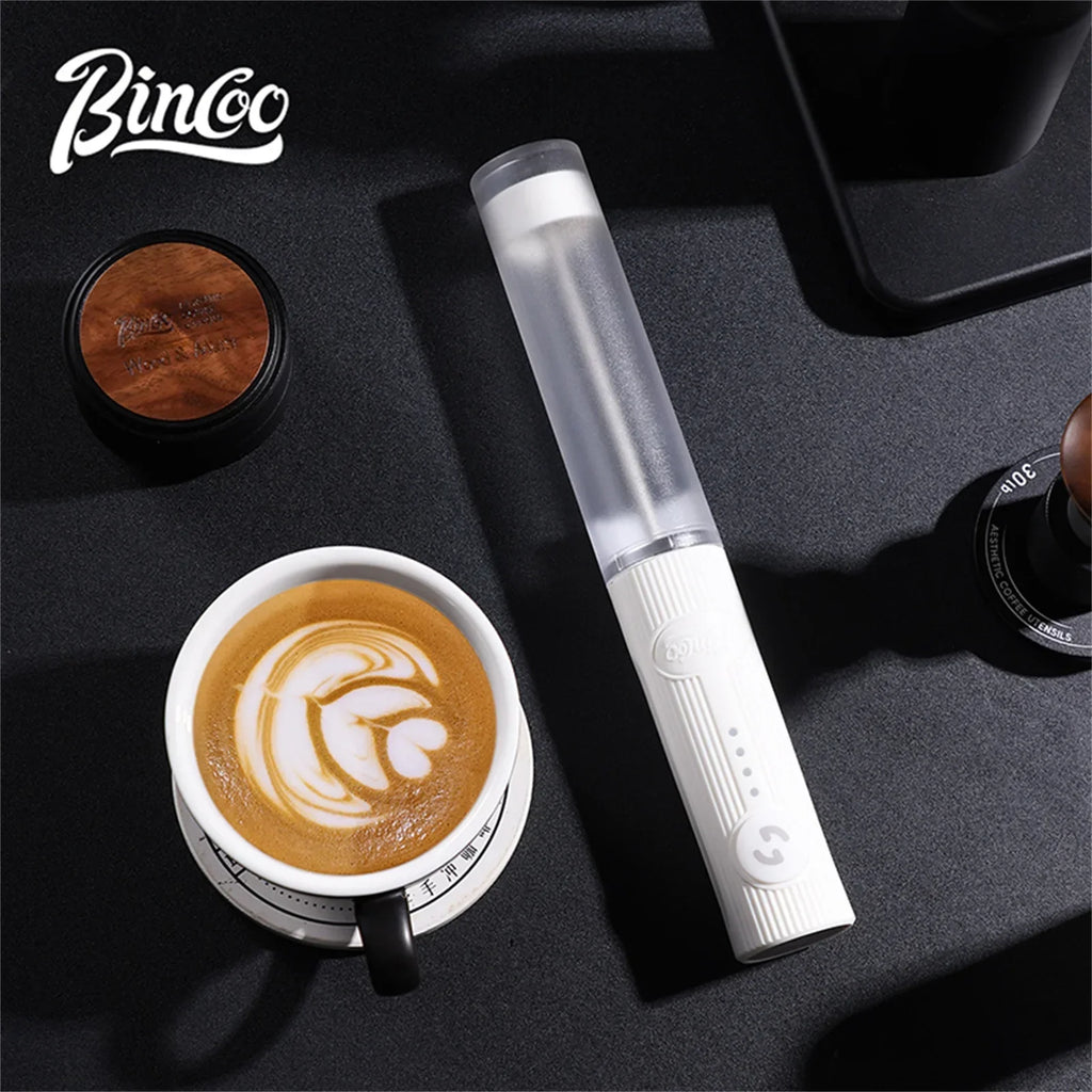 Black wireless electric milk frother with stainless steel whisk head and ergonomic handle — view 4