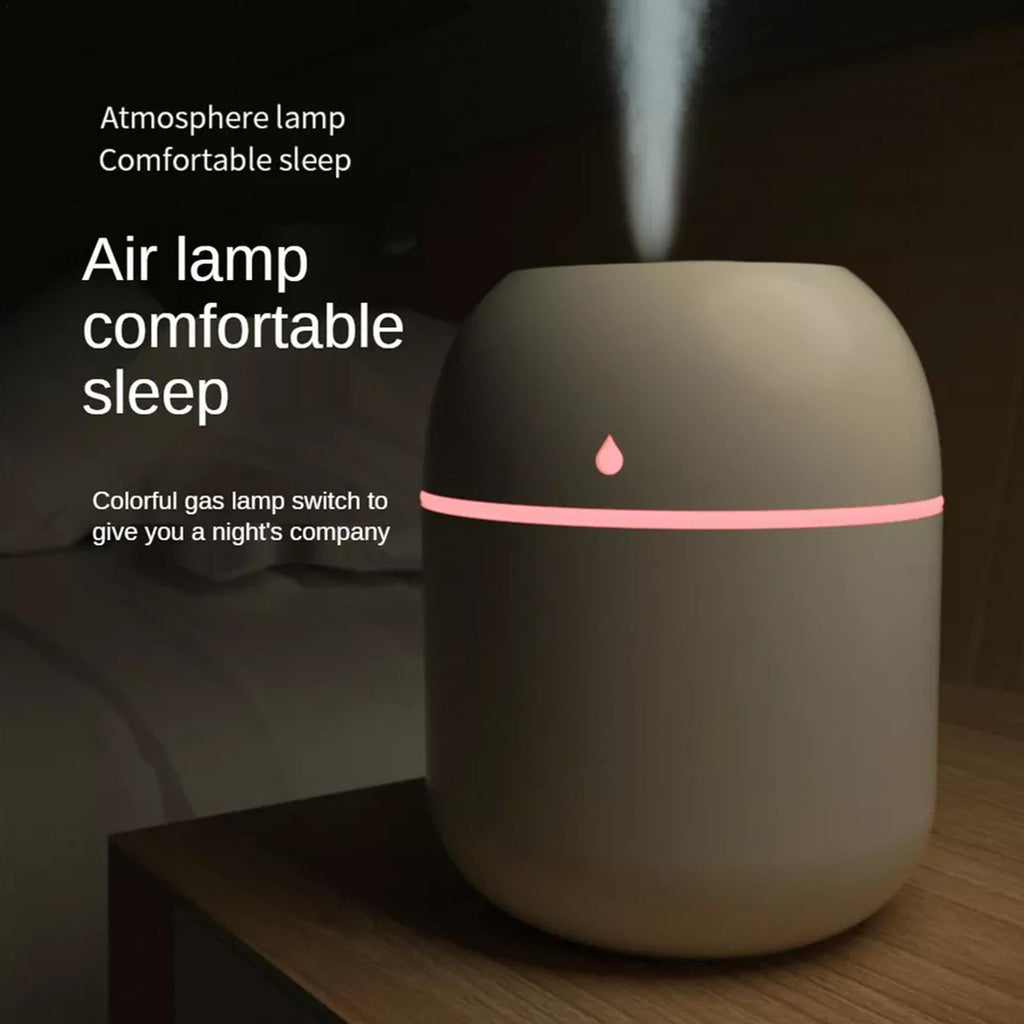 Portable compact USB aroma humidifier for home office desktop in modern design