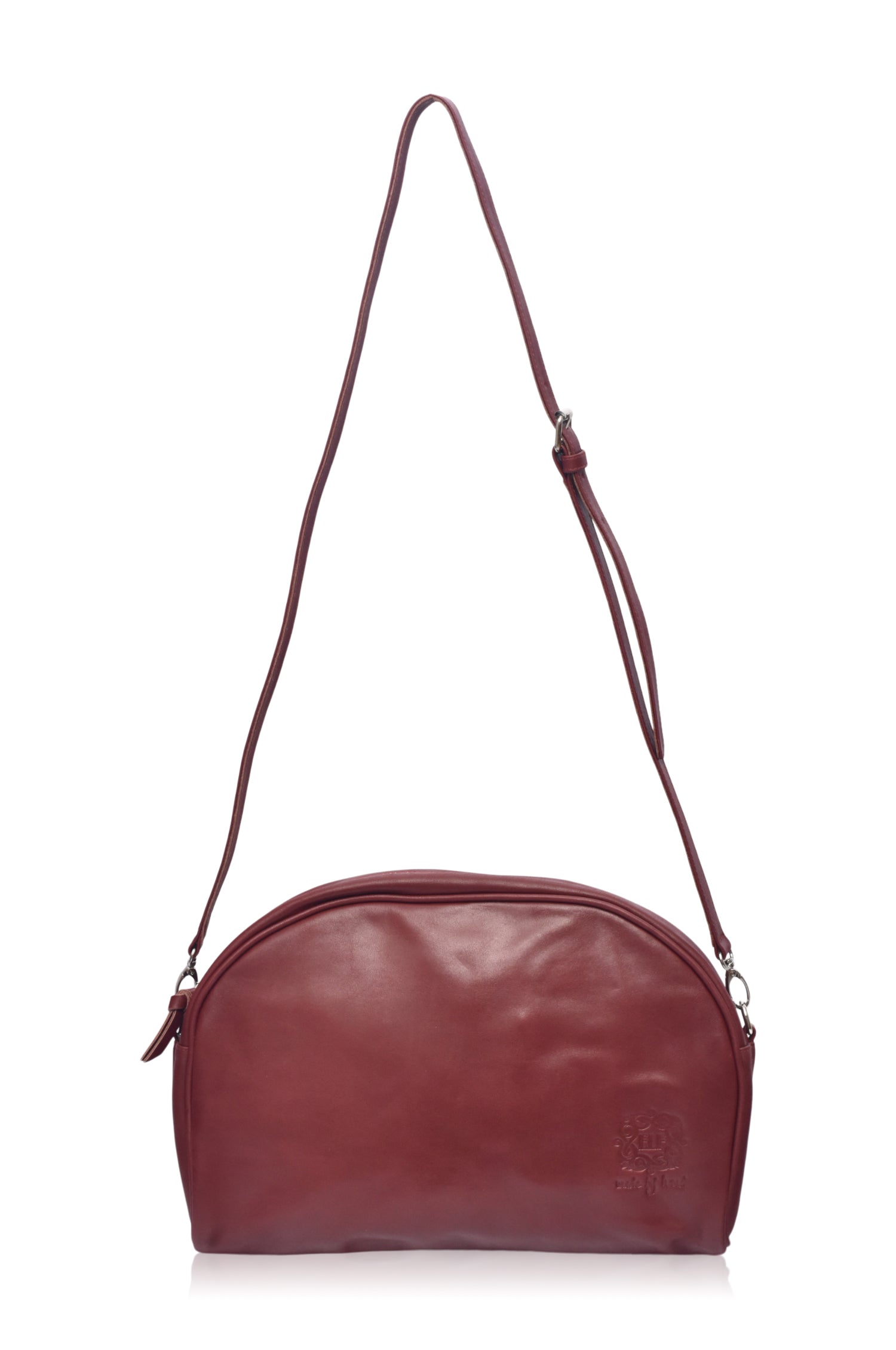 Red genuine leather Sabine handbag with adjustable strap, styled as a crossbody bag or oversized clutch. — view 2