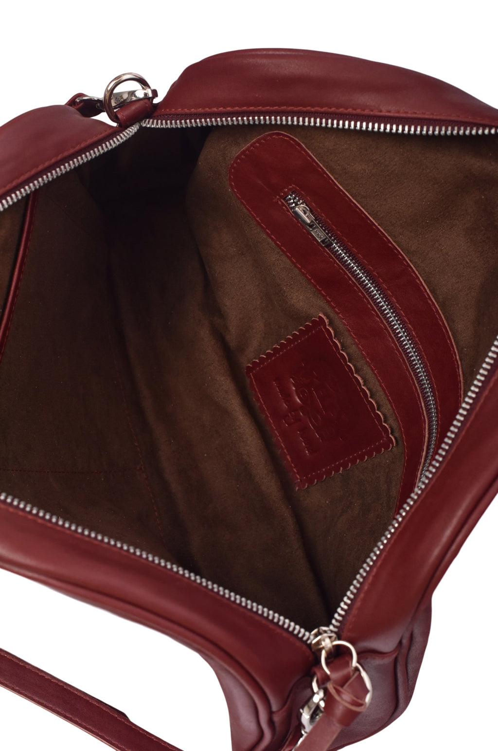 Red genuine leather Sabine handbag with adjustable strap, styled as a crossbody bag or oversized clutch. — view 5