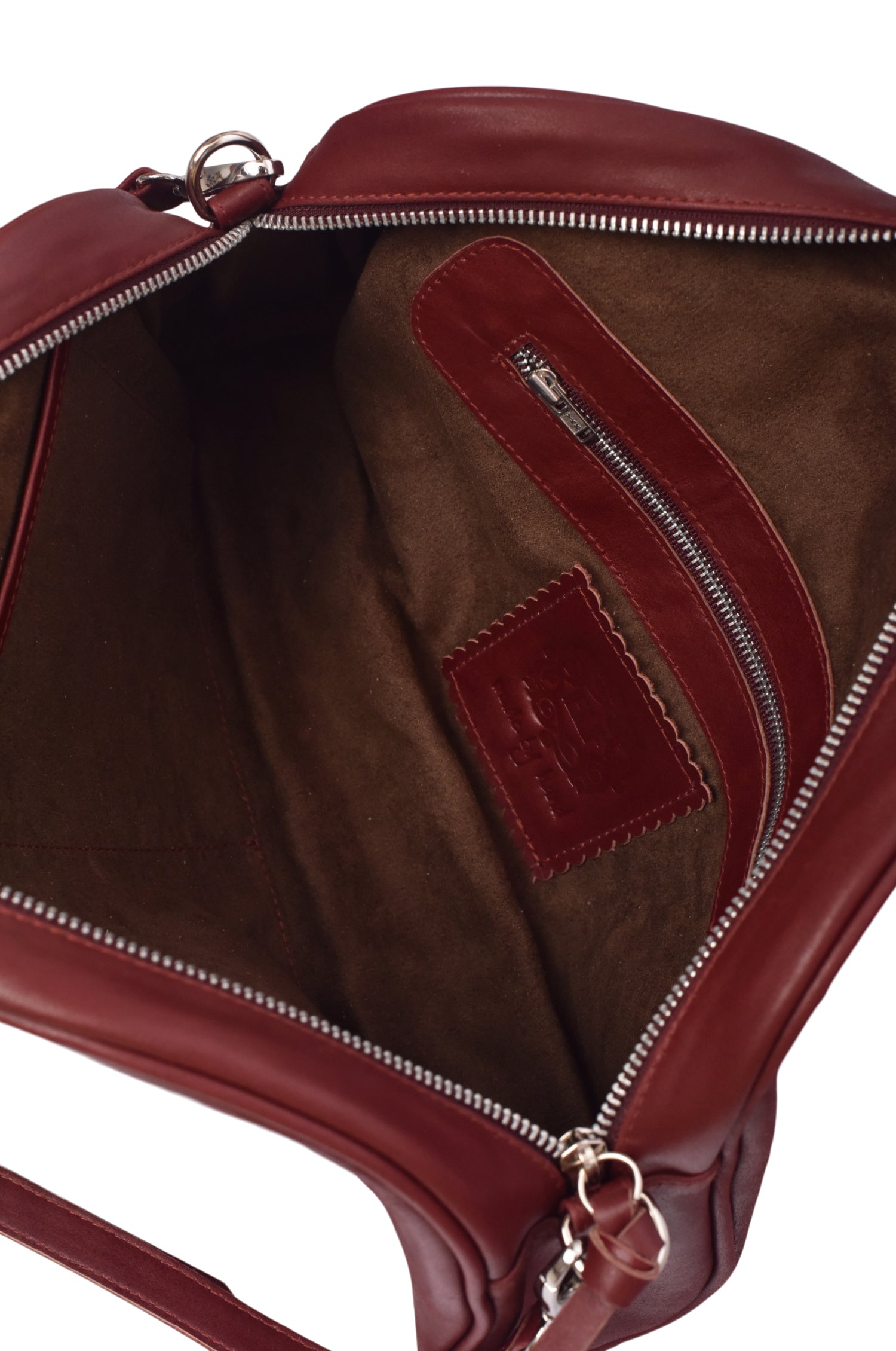 Red genuine leather Sabine handbag with adjustable strap, styled as a crossbody bag or oversized clutch. — view 5
