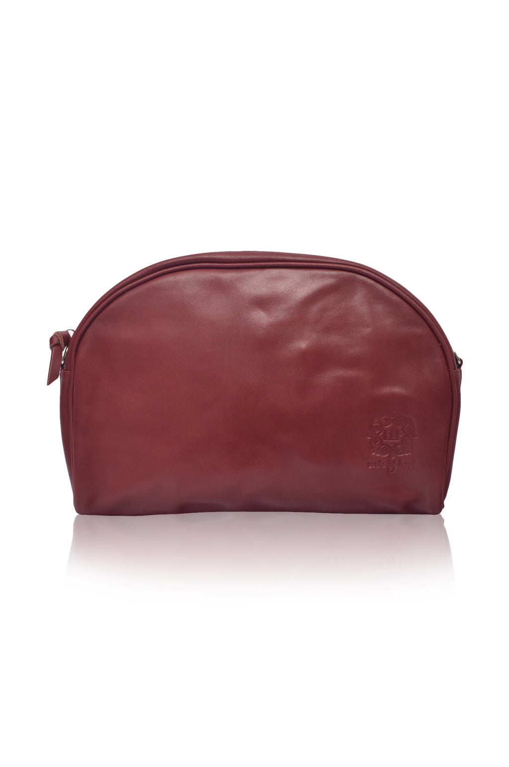 Red genuine leather Sabine handbag with adjustable strap, styled as a crossbody bag or oversized clutch. — view 3