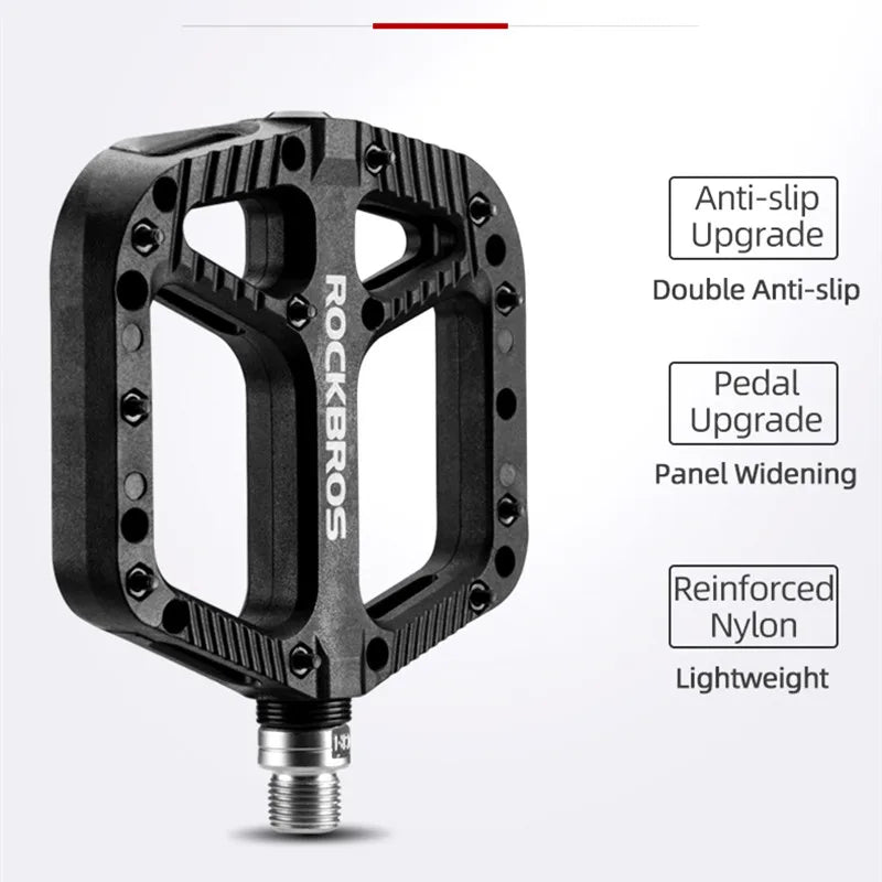 Black ultralight flat platform bicycle pedals made of nylon composite with anti-skid traction pins — view 5