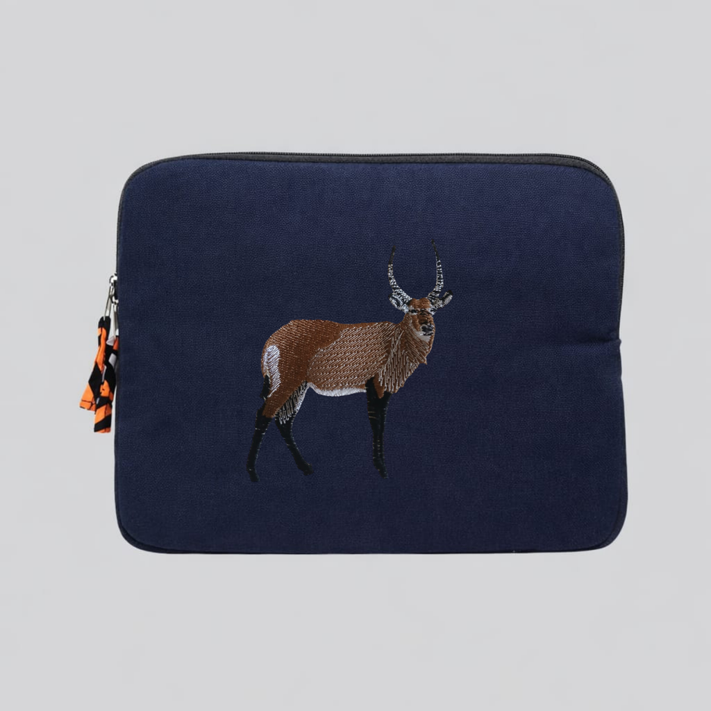 Handmade Kenyan cotton canvas laptop sleeve featuring embroidered African wildlife design in warm earthy tones — view 2