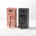 Reusable metallic safety razor with a thick handle available in rose gold or black finishes