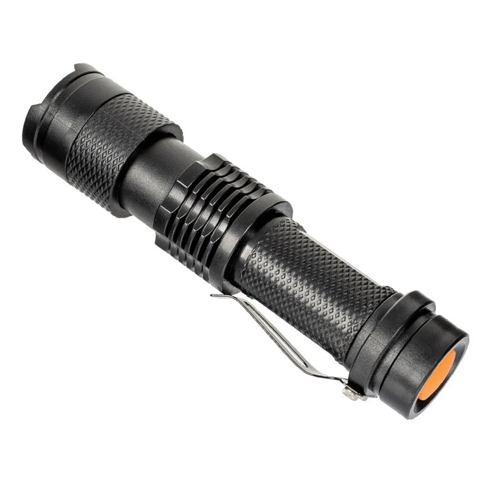 Black waterproof tactical LED flashlight with non-slip texture and tactical tail switch