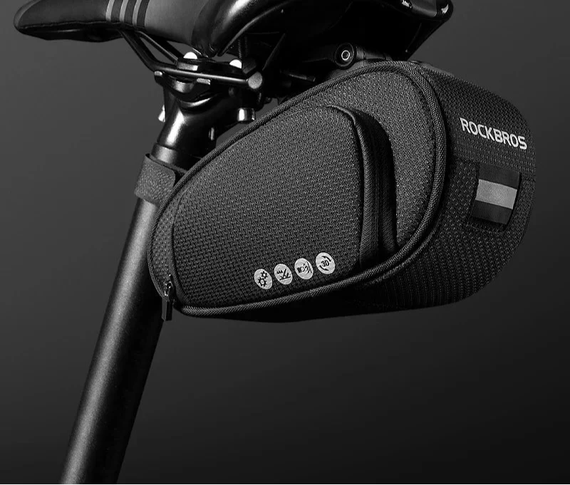 Black rainproof bike saddle bag featuring shockproof padding and quick release bracket mounted under bicycle seat — view 2