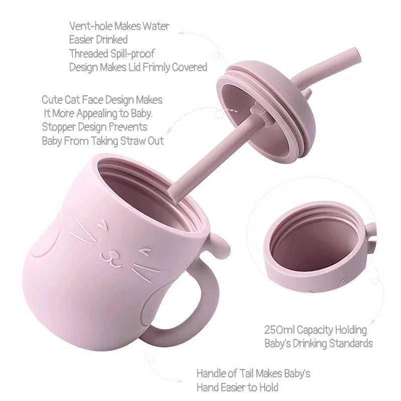 Silicone straw water bottle for toddlers featuring an embossed cat face and curled tail handle. — view 4