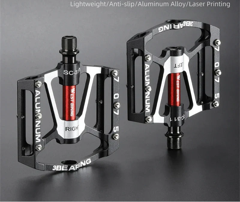 Black 3-bearing CNC aluminum bike pedals with anti-slip traction pins and widened base. — view 3