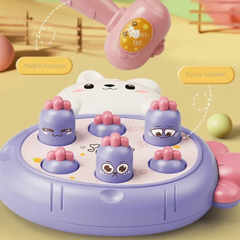 Educational carrot toy game with peeking rabbit, plastic playtime hammers, and bright interactive surface. — view 2
