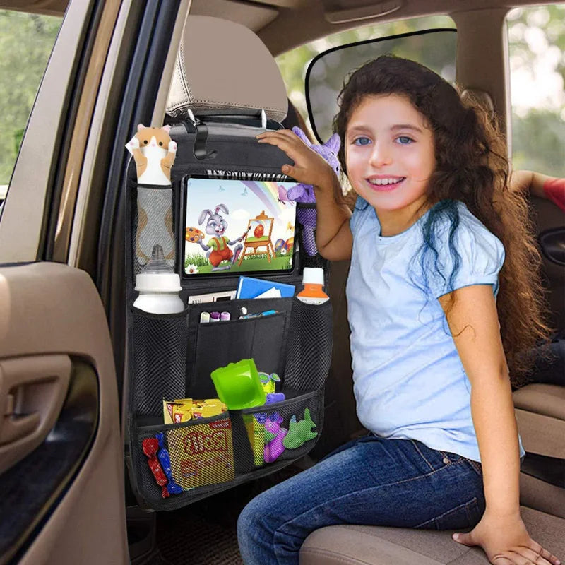 Black car backseat organizer with touch screen tablet holder, mesh pockets, and storage compartments. — view 3