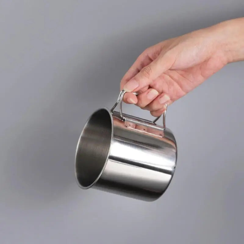 Portable stainless steel carabiner camping mug with folding handle for outdoor adventures. — view 3