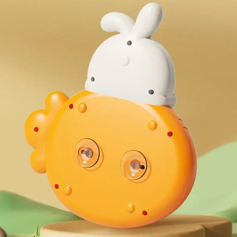 Educational carrot toy game with peeking rabbit, plastic playtime hammers, and bright interactive surface. — view 3