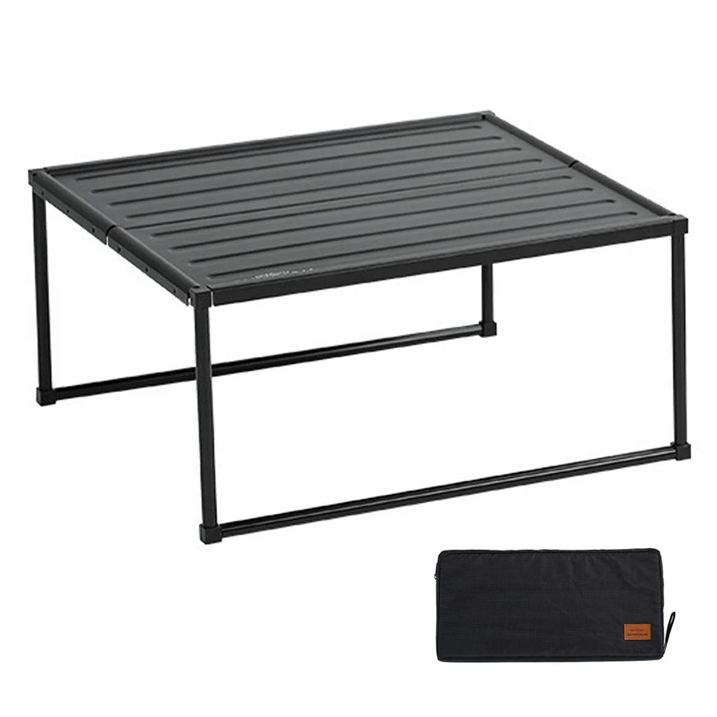 Black folding portable camping table made of lightweight aluminum alloy with included carrying storage bag