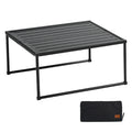 Black folding portable camping table made of lightweight aluminum alloy with included carrying storage bag