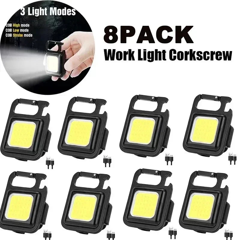White USB rechargeable pocket flashlight with magnetic base and rotatable handle for hands-free illumination — view 2