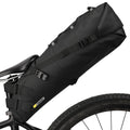 Black 10L waterproof bike saddle bag attached to a bicycle seatpost for rear storage