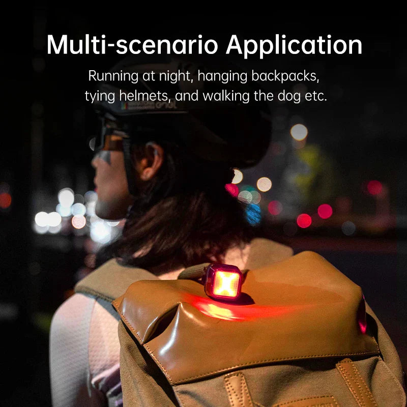 Smart matrix bike tail light glowing red with custom LED pattern and mounting bracket — view 5