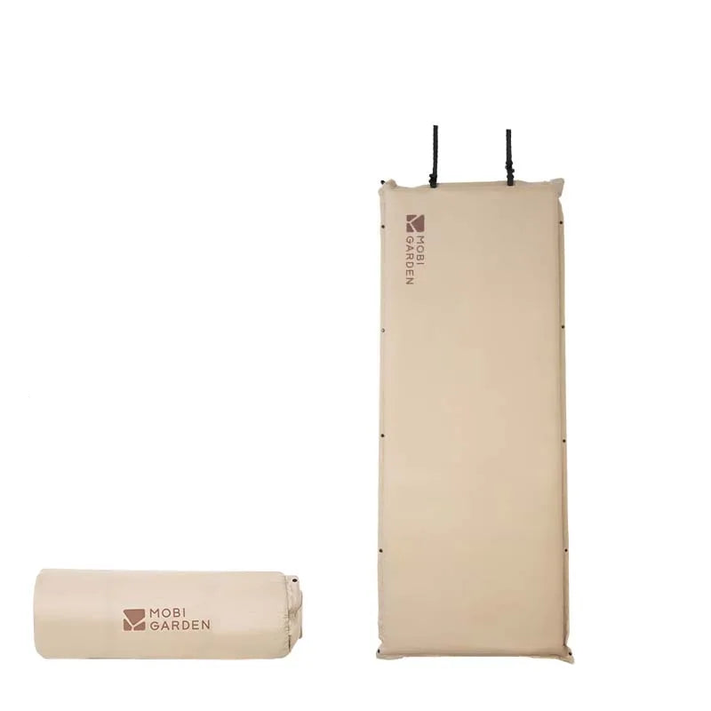 Brown single inflatable camping mattress pad with a thick foam core for outdoor tent setups