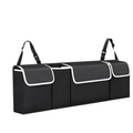 Black polyester car back seat organizer with multiple storage pockets hanging on a vehicle seat