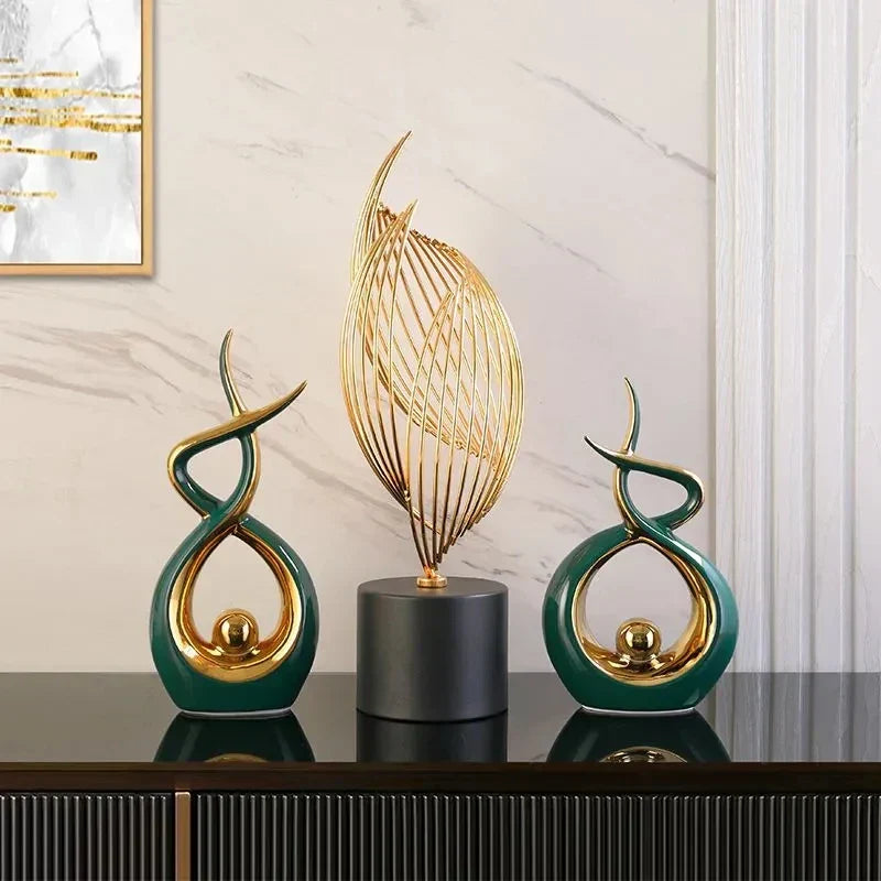 Set of two elegant green abstract resin sculpture statues displayed as modern home decor — view 2