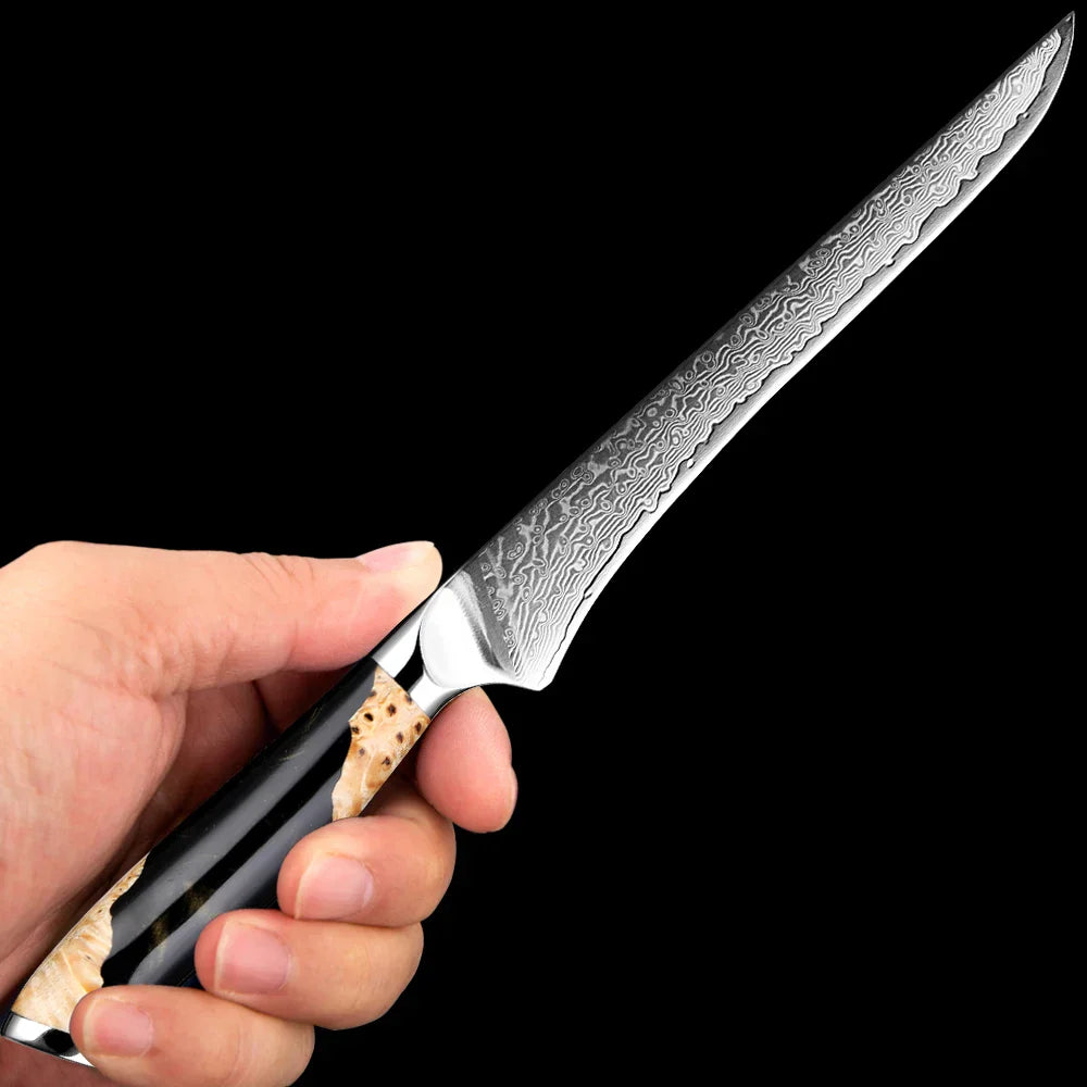 Black 6-inch Damascus steel utility knife with a curved, wave-patterned blade for precision slicing. — view 5