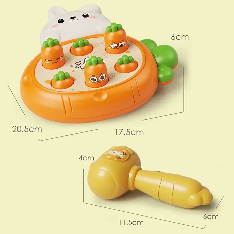 Educational carrot toy game with peeking rabbit, plastic playtime hammers, and bright interactive surface. — view 4