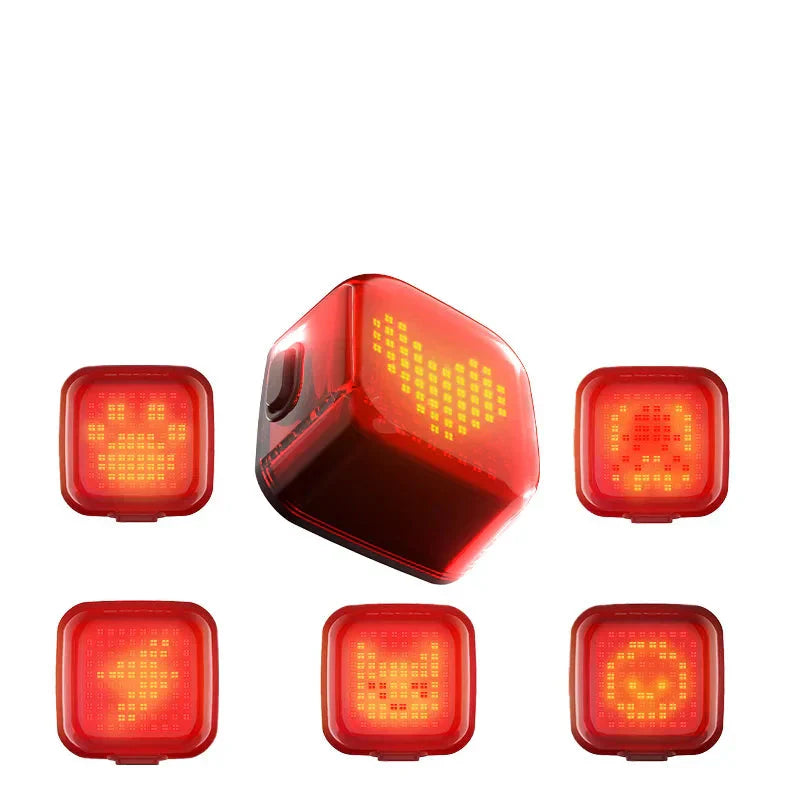 Smart matrix bike tail light glowing red with custom LED pattern and mounting bracket