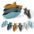 Silicone shark bath toy set of three in soft oceanic colors stacked for compact storage