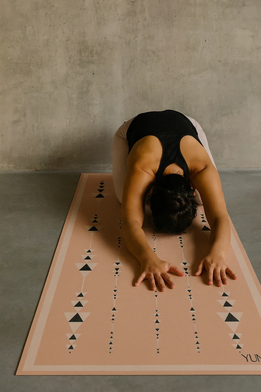Tan eco-friendly 6mm non-slip yoga mat unrolled on the floor for fitness and pilates practice — view 2