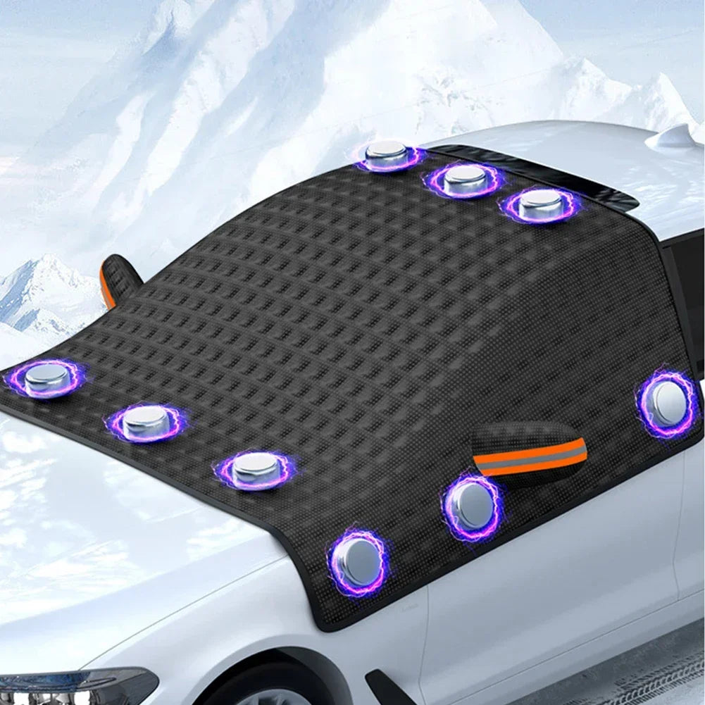 Black magnetic car windshield cover with reflective strips attached to a vehicle in the snow — view 4