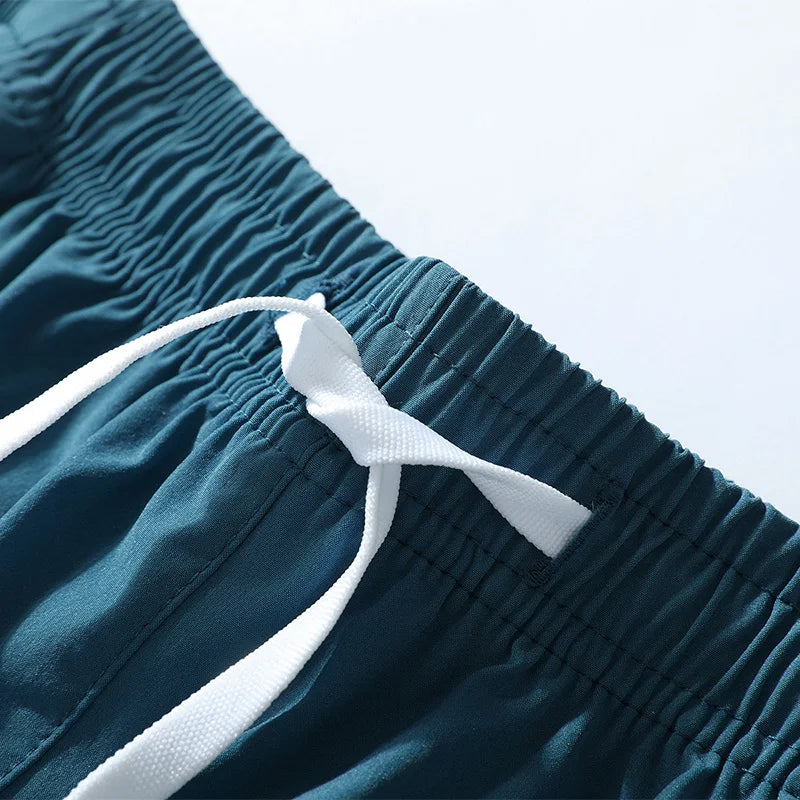 Men's solid quick-dry running shorts in premium breathable polyester material for summer sports — view 3